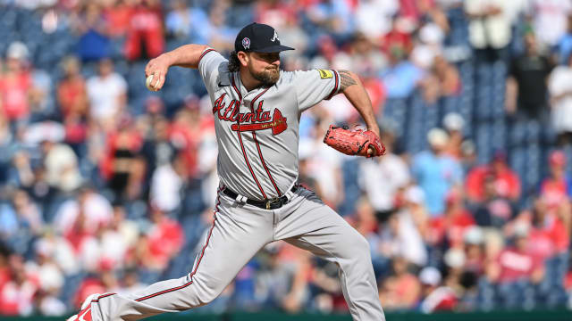 Sep 11, 2023; Philadelphia, Pennsylvania, USA; Atlanta Braves relief pitcher Kirby Yates (22) pitches in the tenth inning against the Philadelphia Phillies at Citizens Bank Park. The Braves won 10-8. Mandatory Credit: John Geliebter-USA TODAY Sports  